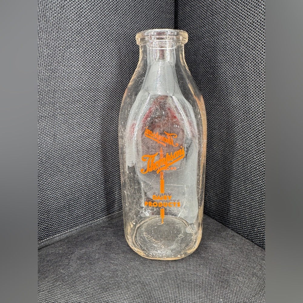 Thompson's Dairy Clear Glass Quart Milk Bottle with Orange Logo